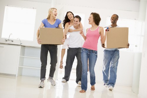 Moving van and packed boxes for a Fulham house move
