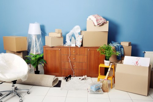 Careful unloading and placement of boxes at a Fulham property
