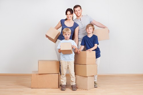 House removals team planning a move on a Fulham residential street