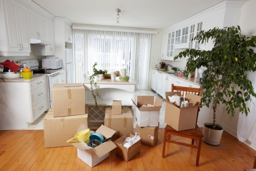 Preparing an office relocation with labelled boxes and workspace setup