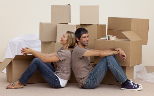 Local removals crew navigating a Fulham apartment move