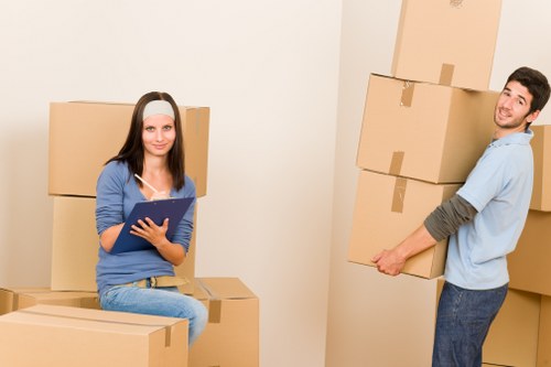 Packed boxes and furniture ready for a flat removal in Fulham