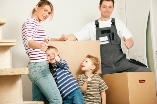 Organized boxes and furniture being loaded for a Fulham removals service